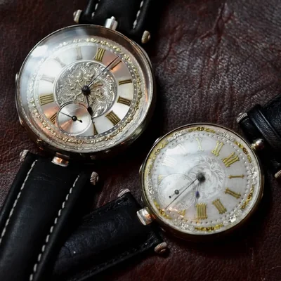 Vintage pocket watch conversion — open face antique wristwatch crown at 12 o'clock